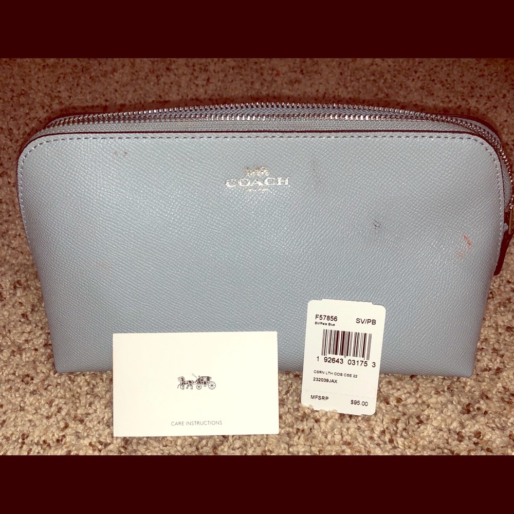 Shiny baby blue/metallic coach makeup bag